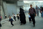 Jabaliya refugeescamp,Gaza strip,oct 2004,  Morning, the Children go to school, when a rocket hit a home killing one and injured 7 others.<br><br>right after the rocket exploded, people start running away from the area in case a next explosions follows<br><br>The violence in the Camp og Jabaliya is excessive, random shooting is continue and shelling or rockets are very regurly.<br>The victims are the locals and militia who integrated in the camps where they also live.