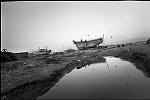 India, Tamil Nadu,february 2005.<br><br>chennai, slowly the boats are being repaired,  sometimes building two boats into one.<br><br>Victims of the Tsunami are struggling to survive after the Tsunami, their main business as fisherman have been made impossible by destroyed boats and nets.<br>while improvising and take the risk to fish the sea using a inferior boat, local people don't want to eat the fish, so prizes go down to 20% of before.<br><br>The Indian Government claims to have the situation under control and don't accept foreign aid, in the meantime they move fisherman away from the beaches to remote areas, where their chances of survival will be even less.<br>