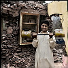 Pakistan, Kashmir  dec2005/febr2006<br>Nala vilage is completely destroyed, a man shows of his muscle power.<br><br>More than 70.000 people have lost their lives during the earthquake in the Pakistan Kashmir regions on October 8.<br>Cities like Balakot , near the epical center report close to 100% destroyed homes that are beyond rebuilding.<br>In the mountain regions of Kashmir, people are difficult to reach and some area's can only be accessed after spring arrives.<br>This creates a huge flood of people that flee the mountains during wintertime, facing the dangerous landslides,<br>to arrive in the hands of the Aid agencies who have a huge task, while some have lack of funding.<br>The fear of total isolation, outbreak of diseases, and traumatized victims is a  long task for the future.<br>In the tents, life tries to find it's rules again, the refugees  try to forget all they have lost and hope for a better future.<br>