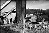 Pakistan, Kashmir  dec2005/febr2006<br>Muzafarrabad, take down the remainings of a hotel that was 9 floors high<br><br>More than 70.000 people have lost their lives during the earthquake in the Pakistan Kashmir regions on October 8.<br>Cities like Balakot , near the epical center report close to 100% destroyed homes that are beyond rebuilding.<br>In the mountain regions of Kashmir, people are difficult to reach and some area's can only be accessed after spring arrives.<br>This creates a huge flood of people that flee the mountains during wintertime, facing the dangerous landslides,<br>to arrive in the hands of the Aid agencies who have a huge task, while some have lack of funding.<br>The fear of total isolation, outbreak of diseases, and traumatized victims is a  long task for the future.<br>In the tents, life tries to find it's rules again, the refugees  try to forget all they have lost and hope for a better future.<br>