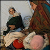 Pakistan, Kashmir  dec2005/febr2006<br>Hatian, sick children with their mothers in a temparary clinic.<br><br>More than 70.000 people have lost their lives during the earthquake in the Pakistan Kashmir regions on October 8.<br>Cities like Balakot , near the epical center report close to 100% destroyed homes that are beyond rebuilding.<br>In the mountain regions of Kashmir, people are difficult to reach and some area's can only be accessed after spring arrives.<br>This creates a huge flood of people that flee the mountains during wintertime, facing the dangerous landslides,<br>to arrive in the hands of the Aid agencies who have a huge task, while some have lack of funding.<br>The fear of total isolation, outbreak of diseases, and traumatized victims is a  long task for the future.<br>In the tents, life tries to find it's rules again, the refugees  try to forget all they have lost and hope for a better future.<br>