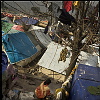 Pakistan, Kashmir  dec2005/febr2006<br>Washing area.<br><br>More than 70.000 people have lost their lives during the earthquake in the Pakistan Kashmir regions on October 8.<br>Cities like Balakot , near the epical center report close to 100% destroyed homes that are beyond rebuilding.<br>In the mountain regions of Kashmir, people are difficult to reach and some area's can only be accessed after spring arrives.<br>This creates a huge flood of people that flee the mountains during wintertime, facing the dangerous landslides,<br>to arrive in the hands of the Aid agencies who have a huge task, while some have lack of funding.<br>The fear of total isolation, outbreak of diseases, and traumatized victims is a  long task for the future.<br>In the tents, life tries to find it's rules again, the refugees  try to forget all they have lost and hope for a better future.<br>